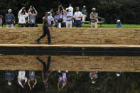 Tiger Woods is photographed as he walks to the 15th green during the first round of the Masters golf tournament Thursday, Nov. 12, 2020, in Augusta, Ga. (AP Photo/Chris Carlson)