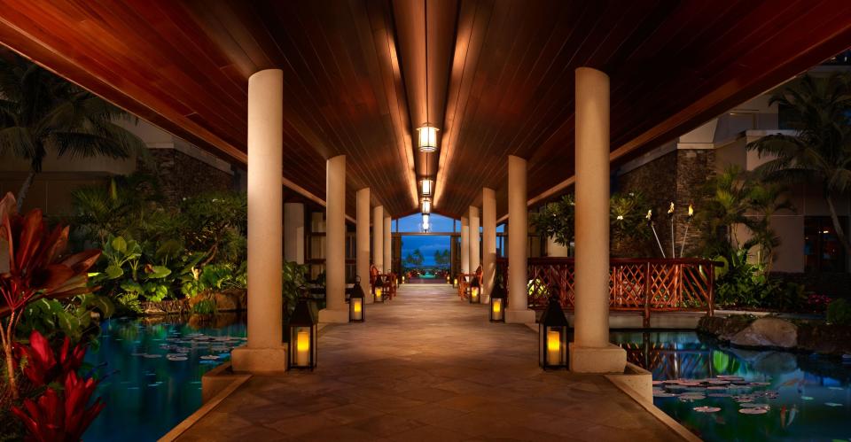 An open-air walkway at the Montage Kapalua Bay.