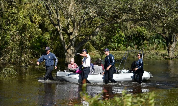 First responders rescued North Port residents who were in need of assistance on Thursday after floodwaters from Hurricane Ian overtook homes in several North Port neighborhoods.