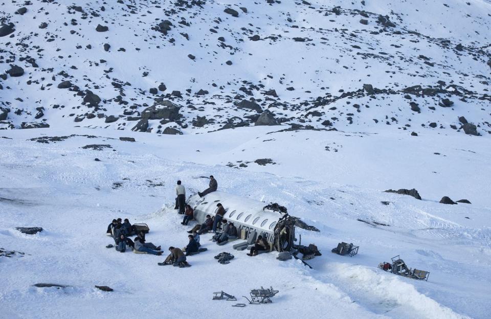 a group of people on a snowy mountain