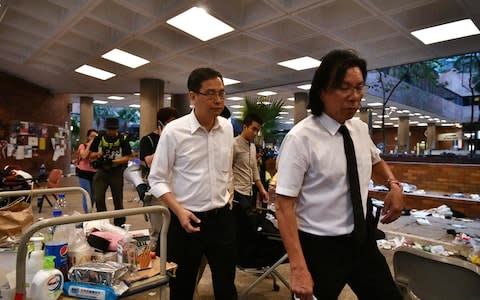 Newly elected district council members visit the Hong Kong Polytechnic University campus - Credit: ANTHONY WALLACE/AFP via Getty Images