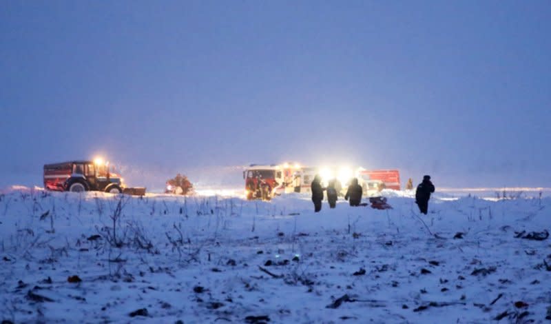 Firefighters and rescue staff arrive at the site of plane crash near Moscow on February 11, 2018. File Photo courtesy of the Russian Emergencies Ministry press service