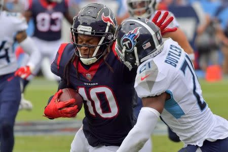 Sep 16, 2018; Nashville, TN, USA; Houston Texans wide receiver DeAndre Hopkins (10) rushes against Tennessee Titans defensive back Malcolm Butler (21) during the first half at Nissan Stadium. Mandatory Credit: Jim Brown-USA TODAY Sports