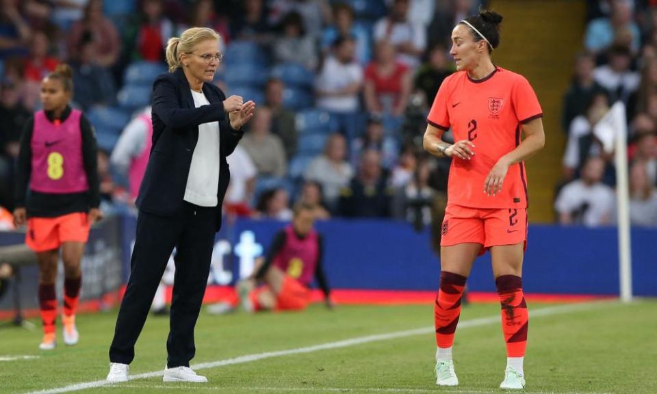 England's Dutch head coach Sarina Wiegman (left) speaks with defender Lucy Bronze during the Women's International friendly match against the Netherlands.