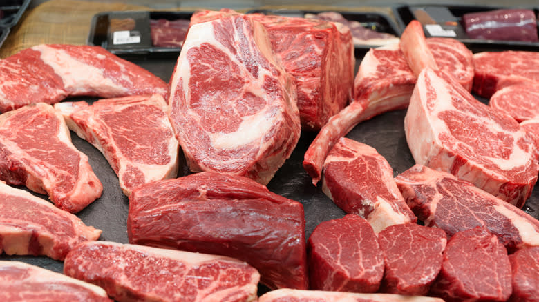 butcher's display of steak cuts