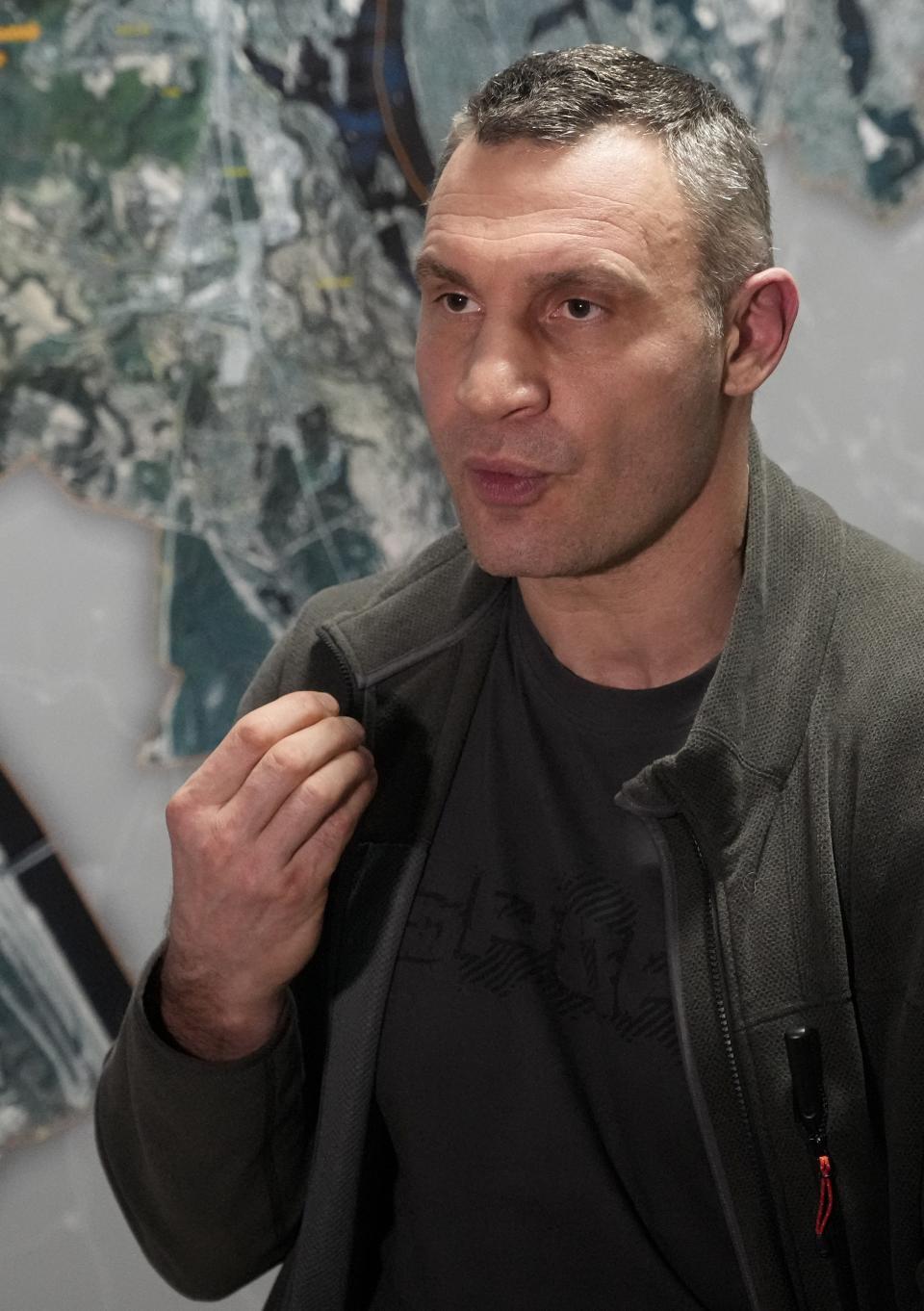 Vitali Klitschko, Kyiv Mayor and former heavyweight champion gestures while speaking during his interview with the Associated Press in his office in the City Hall, in Kyiv, Ukraine, Sunday, Feb. 27, 2022. A Ukrainian official says street fighting has broken out in Ukraine's second-largest city of Kharkiv. Russian troops also put increasing pressure on strategic ports in the country's south following a wave of attacks on airfields and fuel facilities elsewhere that appeared to mark a new phase of Russia's invasion. (AP Photo/Efrem Lukatsky)