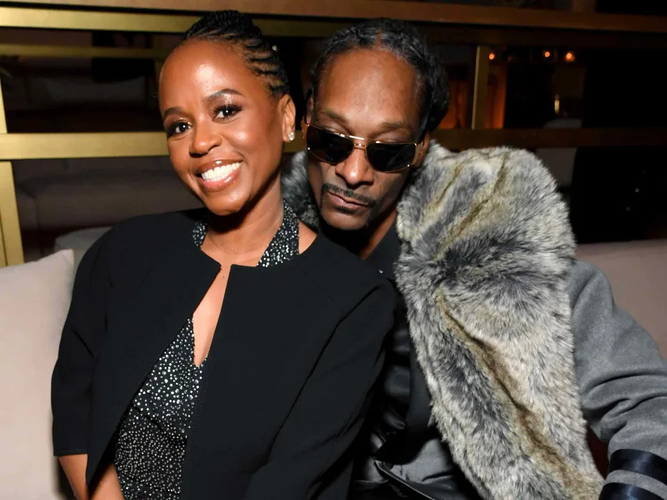 <p>Kevin Mazur/Getty</p> Shante Broadus and Snoop Dogg in Los Angeles in December 2019