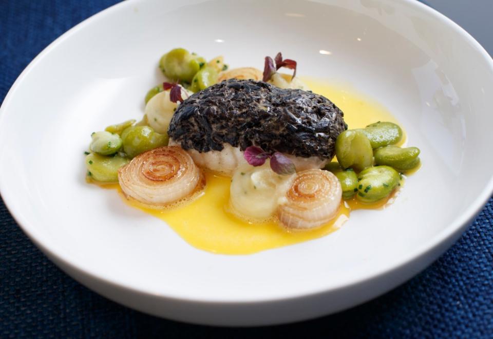 Walker’s winning entree was black trumpet mushroom crusted monkfish with spring onions, fava beans and garlic-potato puree. Tamara Beckwith