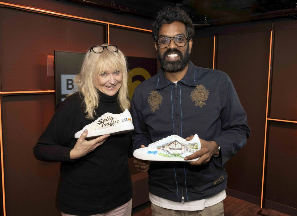 Sally Boazman, known on Radio 2 as Sally Traffic, with trainers Romesh Ranganathan had custom made for her on his morning show on BBC Radio2 (BBC/PA)