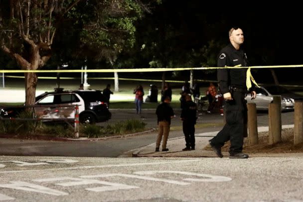 PHOTO: A police officer investigates after a shooting at Peck Park, Los Angeles, July 24, 2022. (Chine Nouvelle/SIPA via Shutterstock)