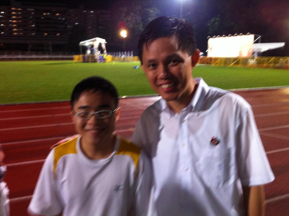 The author with Mr Chan Chun Sing, who was a new PAP candidate, at a rally at Woodlands Stadium during the GE 2011 hustings. (PHOTO: Sean Lim)