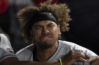 Cleveland Guardians' Josh Naylor celebrates his game tying grand slam off Chicago White Sox relief pitcher Liam Hendriks during the ninth inning of a baseball game Monday, May 9, 2022, in Chicago. (AP Photo/Charles Rex Arbogast)