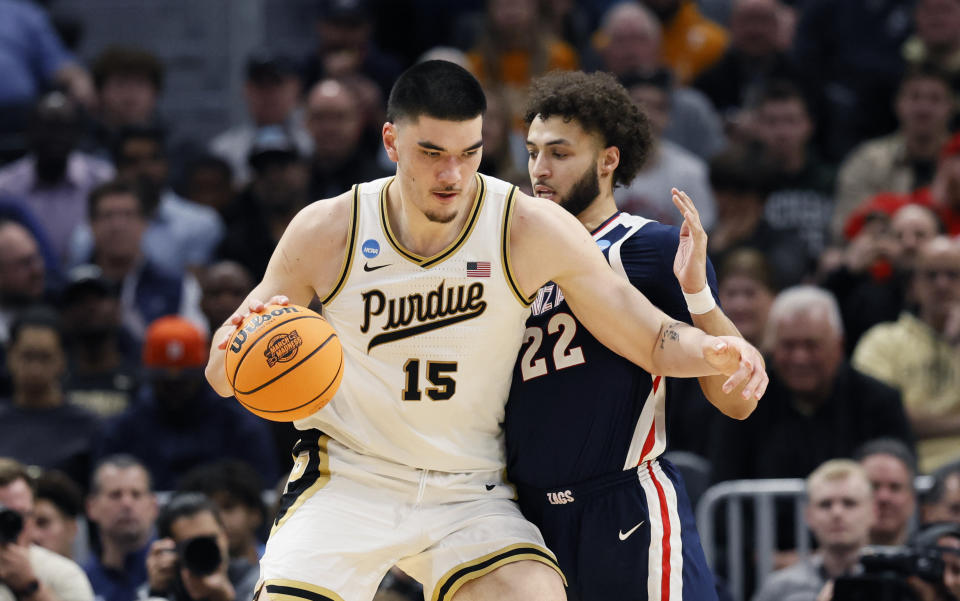 Purdue center Zach Edey (15) goes up against Gonzaga forward Anton Watson (22) during the second half of a Sweet 16 college basketball game in the NCAA Tournament, Friday, March 29, 2024, in Detroit. (AP Photo/Duane Burleson)