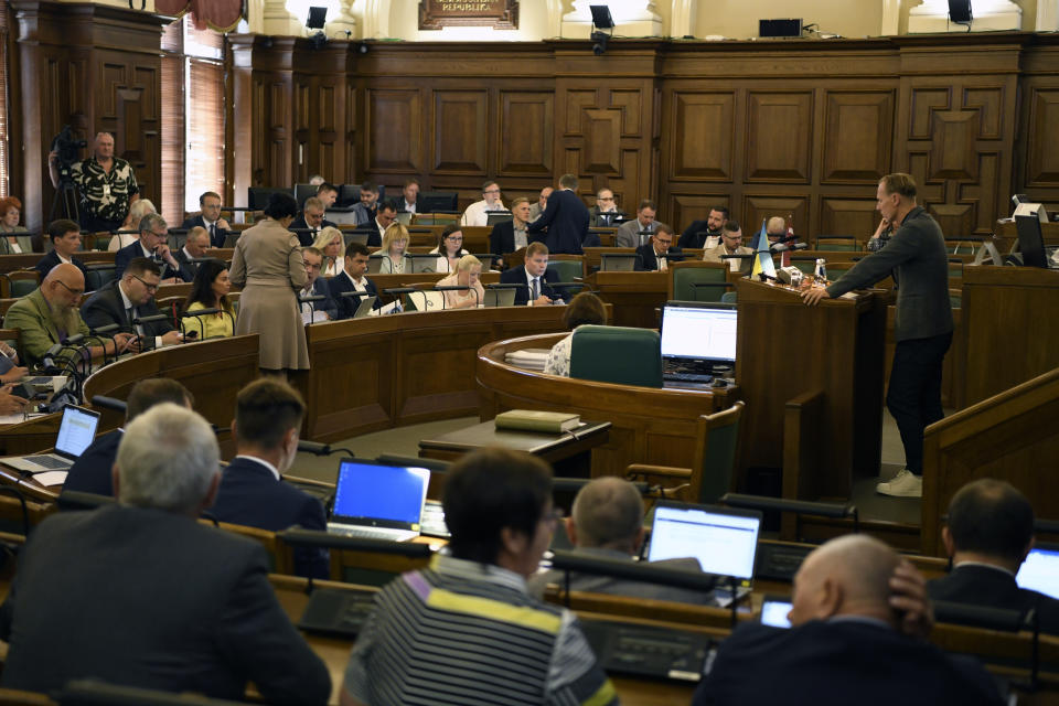 FILE - In this handout photo released by the Parliament, Saeima, of the Republic of Latvia, Latvian lawmakers attend a session in Riga, Latvia, on Aug. 11, 2022. Latvian lawmakers are set to elect a new head of state on Wednesday May 31, 2023 from a field of three candidates with none of them a clear favorite to win ahead of the unpredictable vote by the Baltic nation's 100-seat Saeima legislature. (The Parliament, Saeima, of the Republic of Latvia via AP, File)