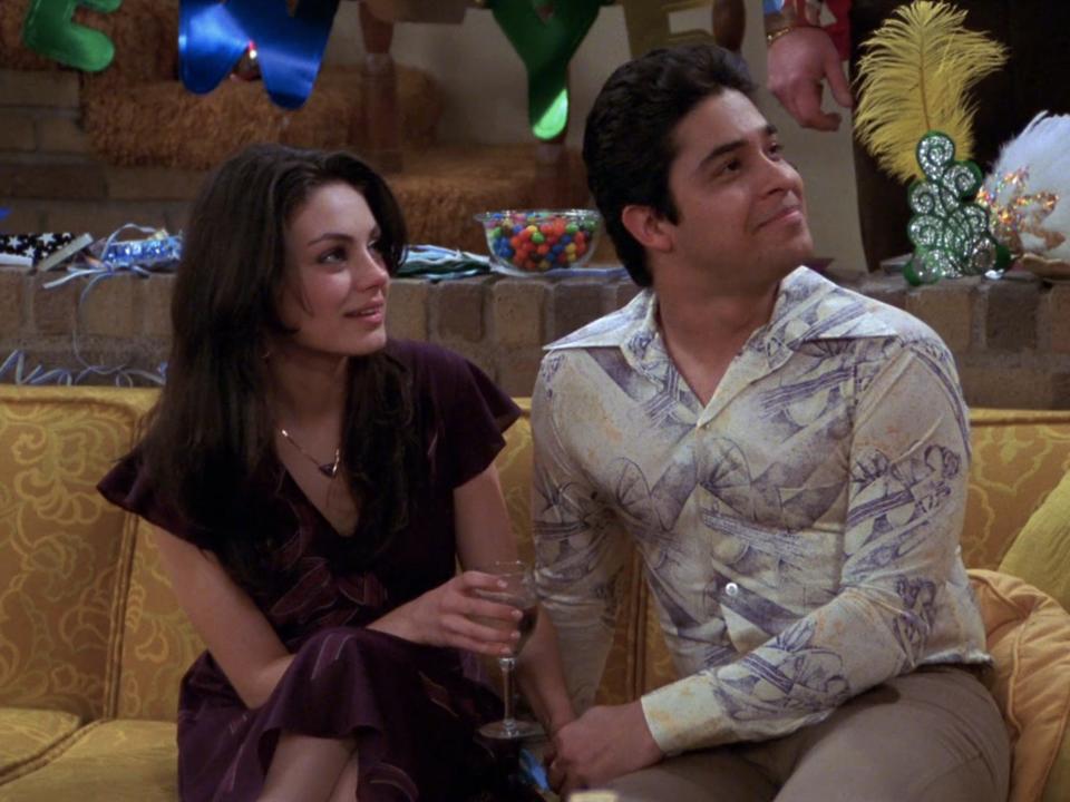 Mila Kunis as Jackie and Wilmer Valderrama as Fez on the series finale of "That '70s Show."