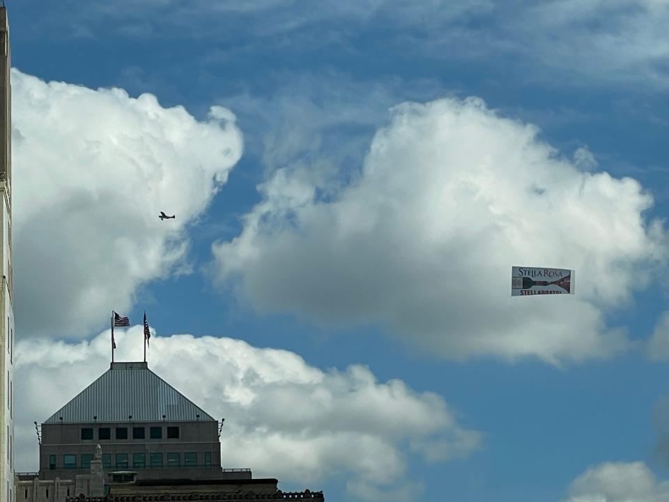 Aerial advertisments filled the skies of downtown Detroit as crowds swelled for the NFL Draft, Thursday, April 25, 2024