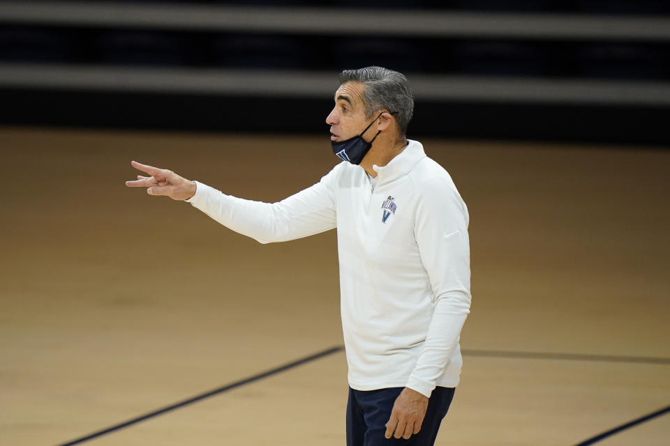 Villanova's Jay Wright coaches during an NCAA college basketball game against Saint Joseph's, Saturday, Dec. 19, 2020, in Villanova, Pa. (AP Photo/Matt Slocum)