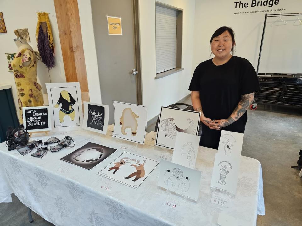 Juliette Onalik sells prints of her drawings inspired by her culture and hometown Makkovik, Labrador.  