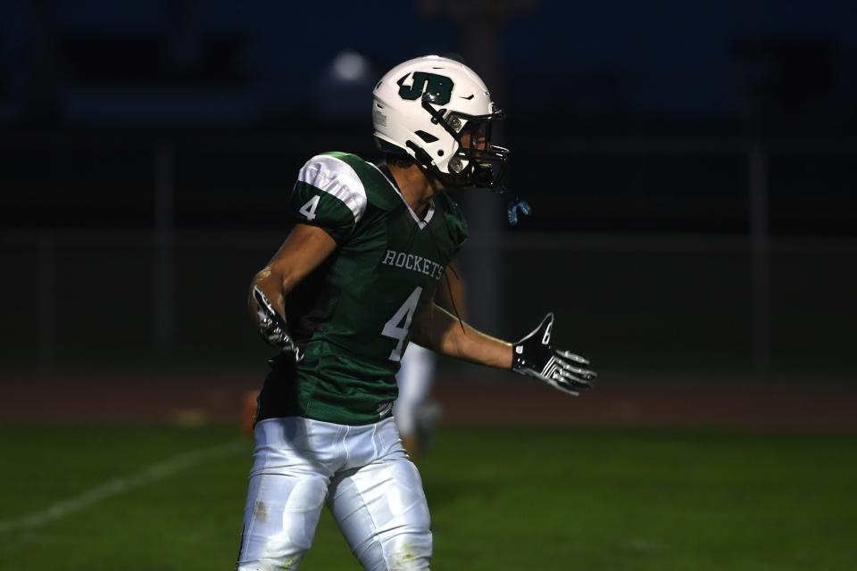 James Buchanan's Jacob Frey (4) celebrates the win, where he had the game-winning TD, against York County Tech on Monday, August 29, 2022