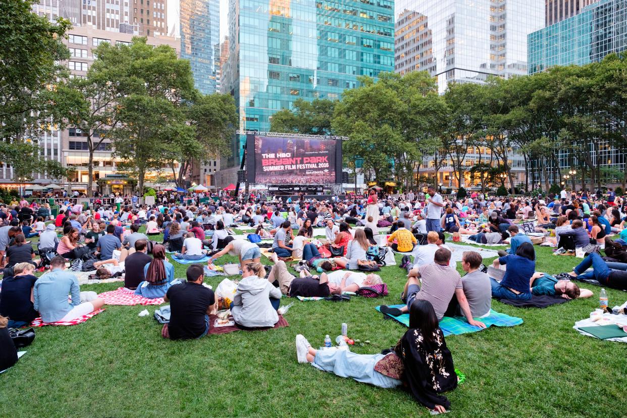 People gather in Bryant Park in midtown Manhattan, New York.