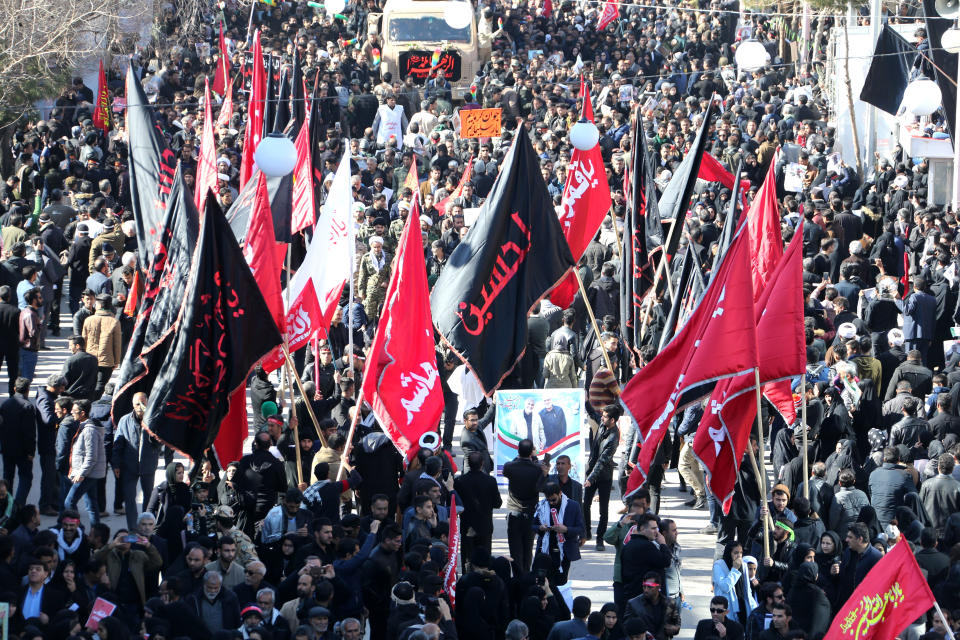 Iranian mourners gather during the final stage of funeral processions for slain top general Qasem Soleimani, in his hometown Kerman on January 7, 2020. - Soleimani was killed outside Baghdad airport Friday in a drone strike ordered by US President Donald Trump, ratcheting up tensions with arch-enemy Iran which has vowed "severe revenge". The assassination of the 62-year-old heightened international concern about a new war in the volatile, oil-rich Middle East and rattled financial markets. (Photo by ATTA KENARE / AFP) (Photo by ATTA KENARE/AFP via Getty Images)