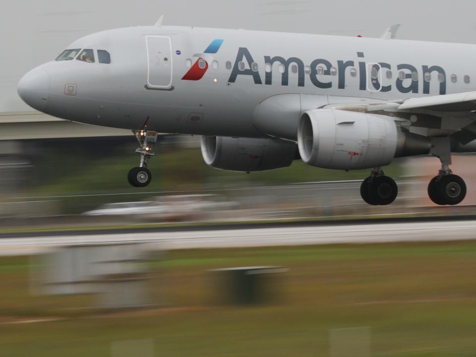 An American Airlines plane lands at the Miami International Airport on June 16, 2021 in Miami, Florida.