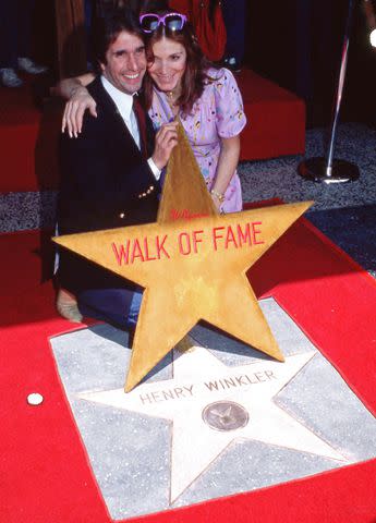 <p>Ralph Dominguez/MediaPunch/Alamy</p> Henry Winkler and wife Stacey Weitzman in 1981