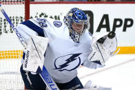 Tampa Bay Lightning goaltender Andrei Vasilevskiy blocks a shot during the second period of an NHL hockey game against the Pittsburgh Penguins in Pittsburgh, Tuesday, Oct. 26, 2021. (AP Photo/Gene J. Puskar)