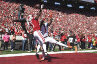 Wisconsin cornerback Jay Shaw (1) interferes with a pass intended for Illinois wide receiver Brian Hightower (7) during the first half of an NCAA college football game Saturday, Oct. 1, 2022, in Madison, Wis. (AP Photo/Kayla Wolf)