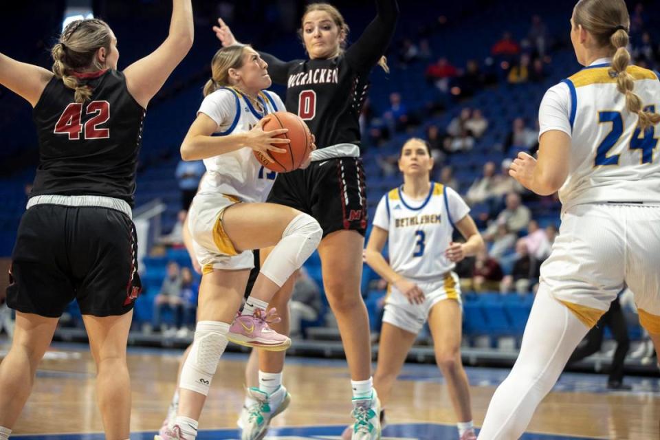 Bethlehem’s Carlie Thurmond (13) tries to drive past McCracken County’s Caroline Sivills (0) during last season’s state tournament in Rupp Arena. Coaches voted McCracken County No. 1 in the 1st Region and Bethlehem No. 1 in the 5th Region to start the season.