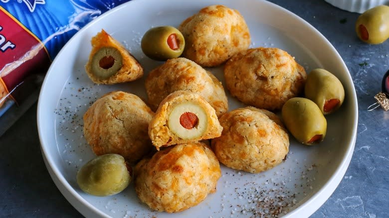 Olive-cheese balls on plate