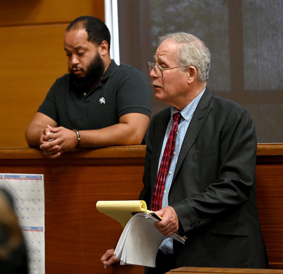 Defense attorney Kenneth Gross, right, speaks during the arraignment of Devin Arroyo, 29, of Taunton, on a charge of motor-vehicle homicide in Framingham District Court, Aug. 17, 2022.