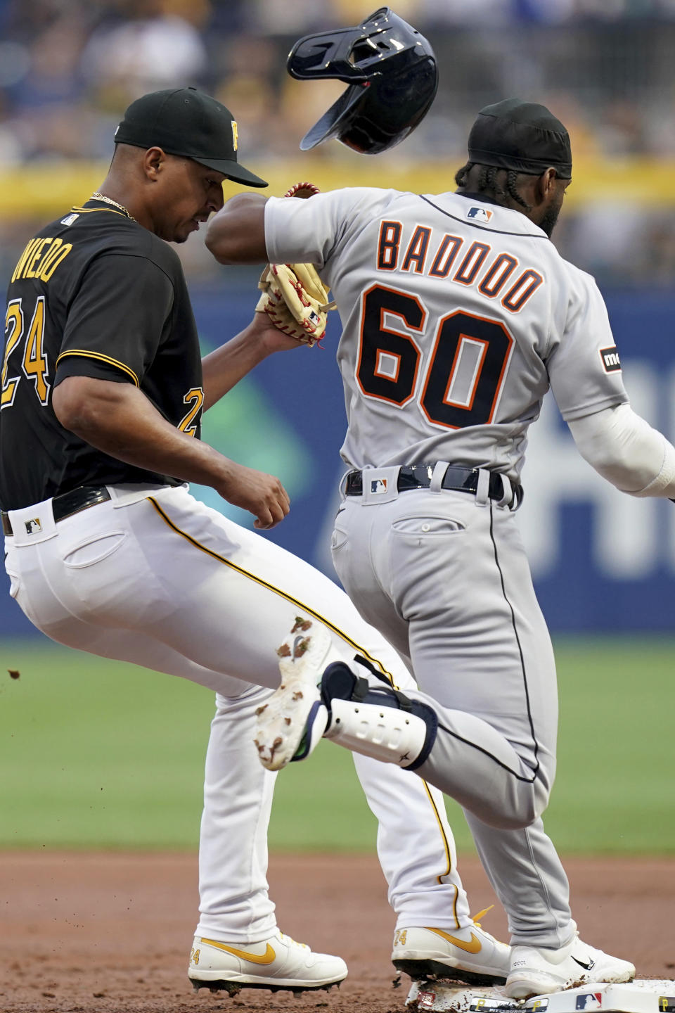 Pittsburgh Pirates starting pitcher Johan Oviedo steps on first base to get Detroit Tigers' Akil Baddoo out in the second inning of a baseball game in Pittsburgh, Tuesday, Aug. 1, 2023. (AP Photo/Matt Freed)