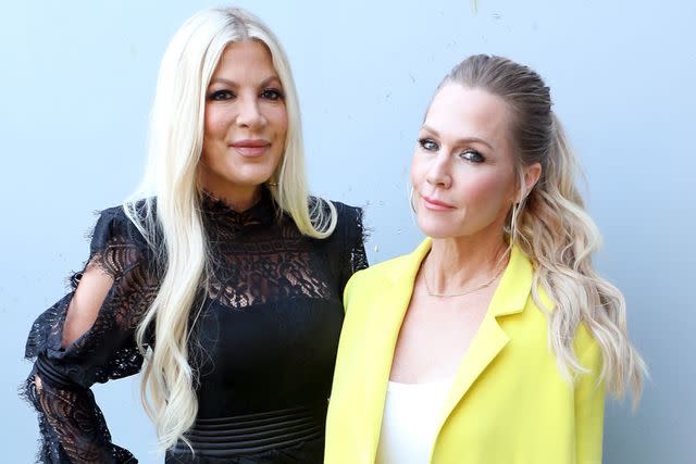 Phillip Faraone/Getty From left: Tori Spelling and Jennie Garth are seen backstage during the 2022 iHeartRadio Wango Tango at Dignity Health Sports Park on June 4, 2022 in Carson, California.