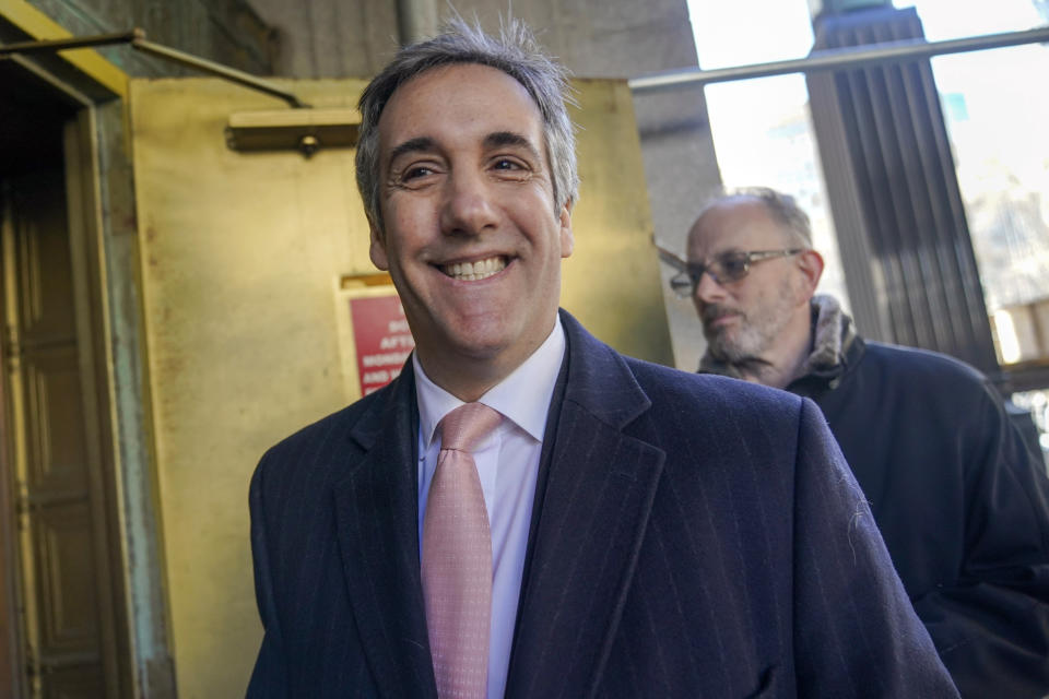 Donald Trump’s former lawyer and fixer Michael Cohen smiles as he arrives for a second day of testimony before a grand jury investigating hush money payments he arranged and made on the former president’s behalf, Wednesday, March 15, 2023, in New York. (AP Photo/Mary Altaffer)