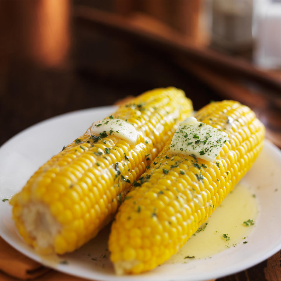 Two corns on the cob.