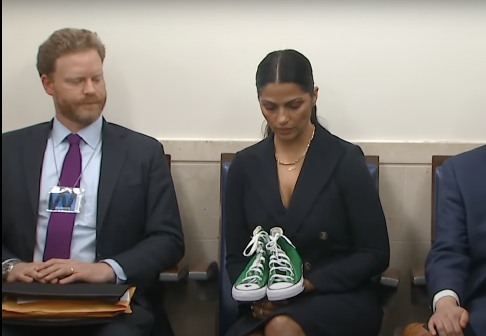 Camila Alves holds the Converse sneakers worn by Maite Rodriguez.