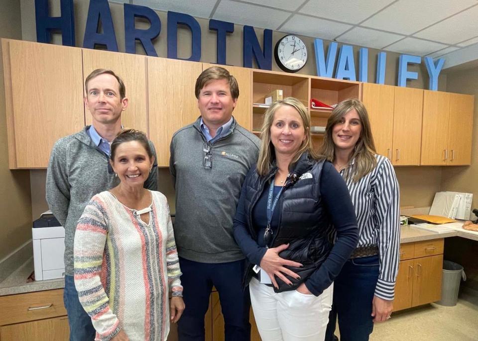 Principal of the Year Rob Speas (center) believes in surrounding himself with a great team at Hardin Valley Academy. Pictured  Monday, March 28, 2022, are Kellie Ivens and Ashli Beeler; (back) David Combs and Nicole Flory.