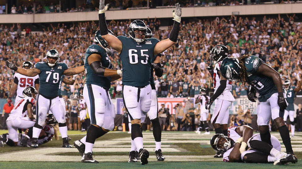 Lane Johnson #65 celebrates a two-point conversion by Jay Ajayi during the fourth quarter. (Photo by Mitchell Leff/Getty Images)