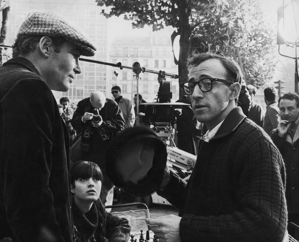 Left to right: Irish actor Peter O'Toole, French actress Nicole Karen, American actor, writer and comedian Woody Allen and English director Clive Donner in Montparnasse, Paris during filming of 'What's New, Pussycat', 1965.&nbsp;