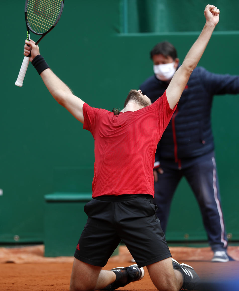 Stefanos Tsitsipas of Greece celebrates after defeating Andrey Rublev of Russia during the Monte Carlo Tennis Masters tournament finals in Monaco, Sunday, April 18, 2021. (AP Photo/Jean-Francois Badias)