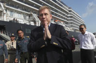 U.S. Ambassador to Cambodia W. Patrick Murphy arrives at the sea port where the MS Westerdam, owned by Holland America Line, docked in Sihanoukville, Cambodia, Saturday, Feb. 15, 2020. After being stranded at sea for two weeks because five ports refused to allow their cruise ship to dock, the passengers of the MS Westerdam were anything but sure their ordeal was finally over. (AP Photo/Heng Sinith)