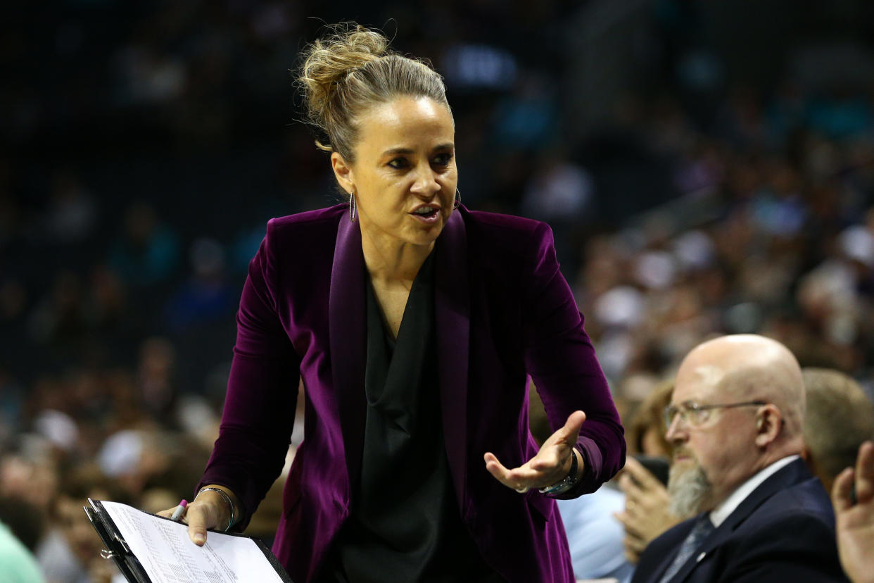 Mar 3, 2020; Charlotte, North Carolina, USA; San Antonio Spurs assistant Becky Hammon talks to players during the first half against the Charlotte Hornets at Spectrum Center. Mandatory Credit: Jeremy Brevard-USA TODAY Sports