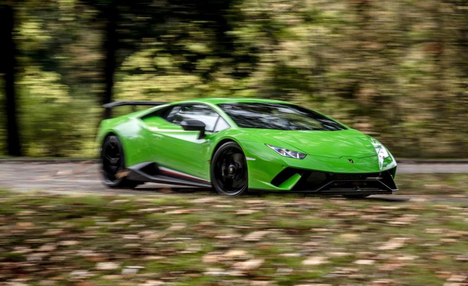 <p>Not only is <a rel="nofollow noopener" href="https://www.caranddriver.com/reviews/2018-lamborghini-huracan-performante-test-review" target="_blank" data-ylk="slk:the Lamborghini Huracán Performante;elm:context_link;itc:0;sec:content-canvas" class="link ">the Lamborghini Huracán Performante</a> the quickest car we tested in 2018, it is among <a rel="nofollow noopener" href="https://www.caranddriver.com/features/g15383525/car-and-driver-tested-the-quickest-cars-from-the-1950s-to-today/" target="_blank" data-ylk="slk:the quickest cars we have tested, ever;elm:context_link;itc:0;sec:content-canvas" class="link ">the quickest cars we have tested, <em>ever</em></a>. Credit goes to the Lambo's 631-hp V-10 engine, all-wheel drive, and grippy Pirelli P Zero Trofeo R tires. The V-10 engine sounds fast, too, pummeling the cabin with 100 decibels of noise at wide-open throttle, one of the <em>loudest</em> figures we recorded all year. </p>