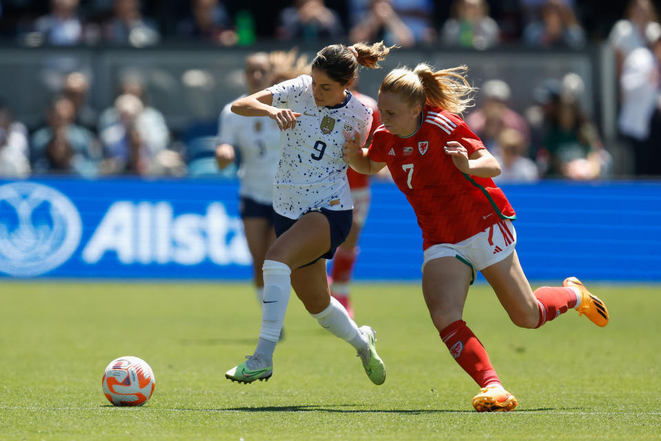 Savannah DeMelo competes for the ball against Ceri Holland of Wales on July 9, 2023.<span class="copyright">Lachlan Cunningham—USSF/Getty Images</span>