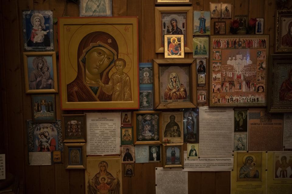 Icons hang on the wall of the Orthodox chapel on Orthodox Christmas in Barentsburg, Norway, Saturday, Jan. 7, 2023. (AP Photo/Daniel Cole)