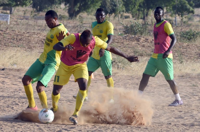 El Kanemi Warriors players train on a sandy pitch in Maiduguri on February 2, 2016