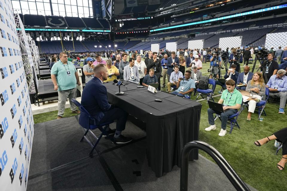Northwestern's interim head coach David Braun speaks during an NCAA college football news conference at the Big Ten Conference media days at Lucas Oil Stadium, Wednesday, July 26, 2023, in Indianapolis. (AP Photo/Darron Cummings)