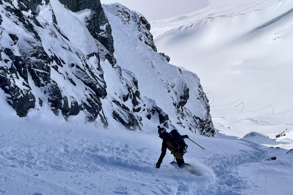 Whitney Gilliam cruising down a Tarfala Valley couloir; (photo/Drew Zieff)