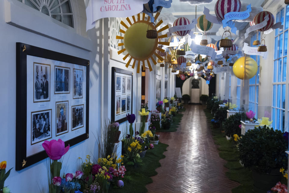 Decorations for the White House Easter Egg Roll adorn the East Colonnade of the White House, Thursday, March 28, 2024, in Washington. (AP Photo/Evan Vucci)